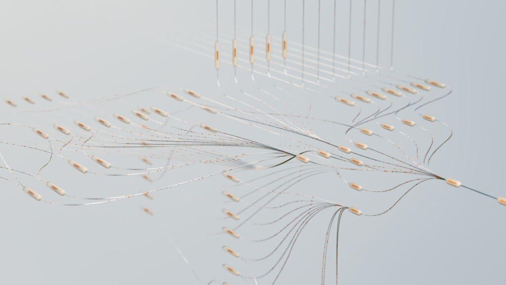 Abstract 3D illustration of glowing nerve-like fibers converging and branching against a soft gray background, representing signaling pathways between the nervous system and the immune system.